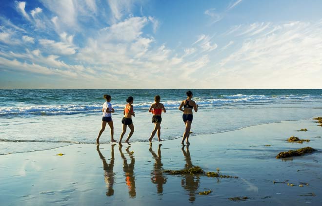 fitness - running, jogging on the beach